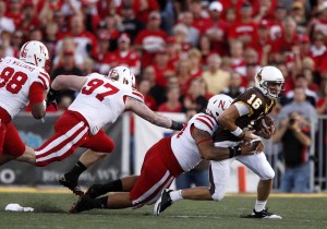 Brett Smith is brought down by the Nebraska defense, the two teams last met in 2011.