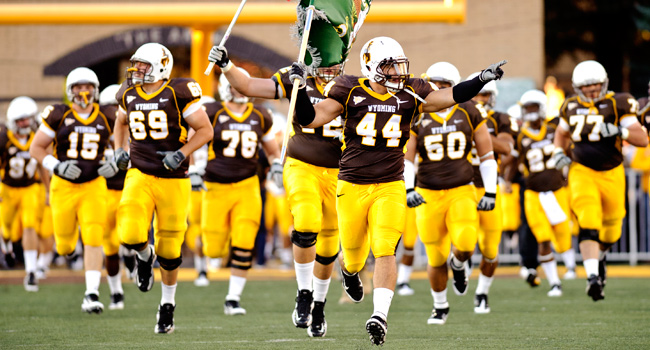 The Wyoming football team will play its second game of the season on ESPN2 vs Nebraska on September 10th. (Photo via Wyoming Athletics)