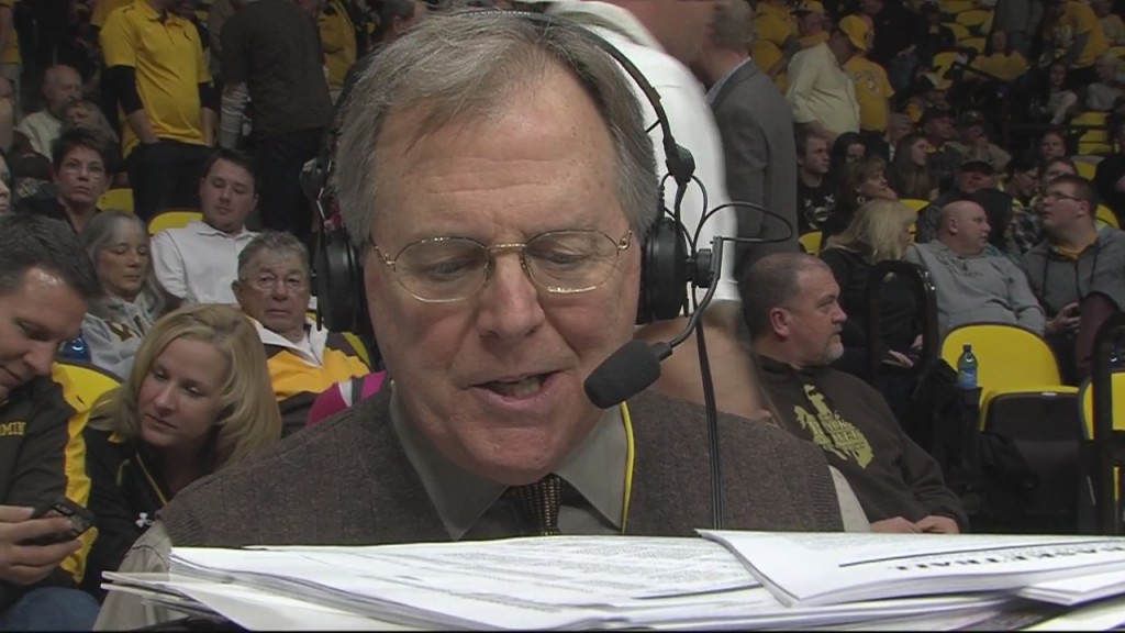Dave Walsh is seen broadcasting a recent Cowboy basketball game at the Arena Auditorium. Dave Walsh has been the voice of the Cowboys for the past 31 years. (photo via KGWN TV)