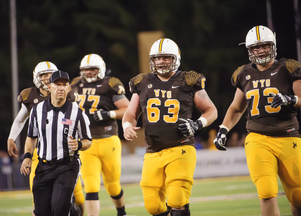 Senior offensive lineman Rafe Kiely will be an important piece to the Wyoming offensive line this coming season. He, along with Chase Roullier, will be relied on being the anchors of the line. (Photo via Wyoming Athletics)