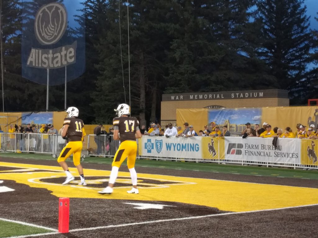 Wyoming quarterback Josh Allen won the game for Wyoming in triple overtime on Saturday night. Allen rushed from seven yards out to beat Northern Illinois 40-34. (Photo via WyoNation.com)